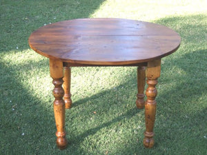 The Dubliner round farm or pub style table made with reclaimed barn wood by Arcadian Cottage in Phoenix, Arizona