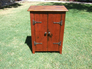 The Old Carrington Cabinet handmade with reclaimed barn wood by Arcadian Cottage in Phoenix, Arizona. Painted with Salem Red Milk Paint